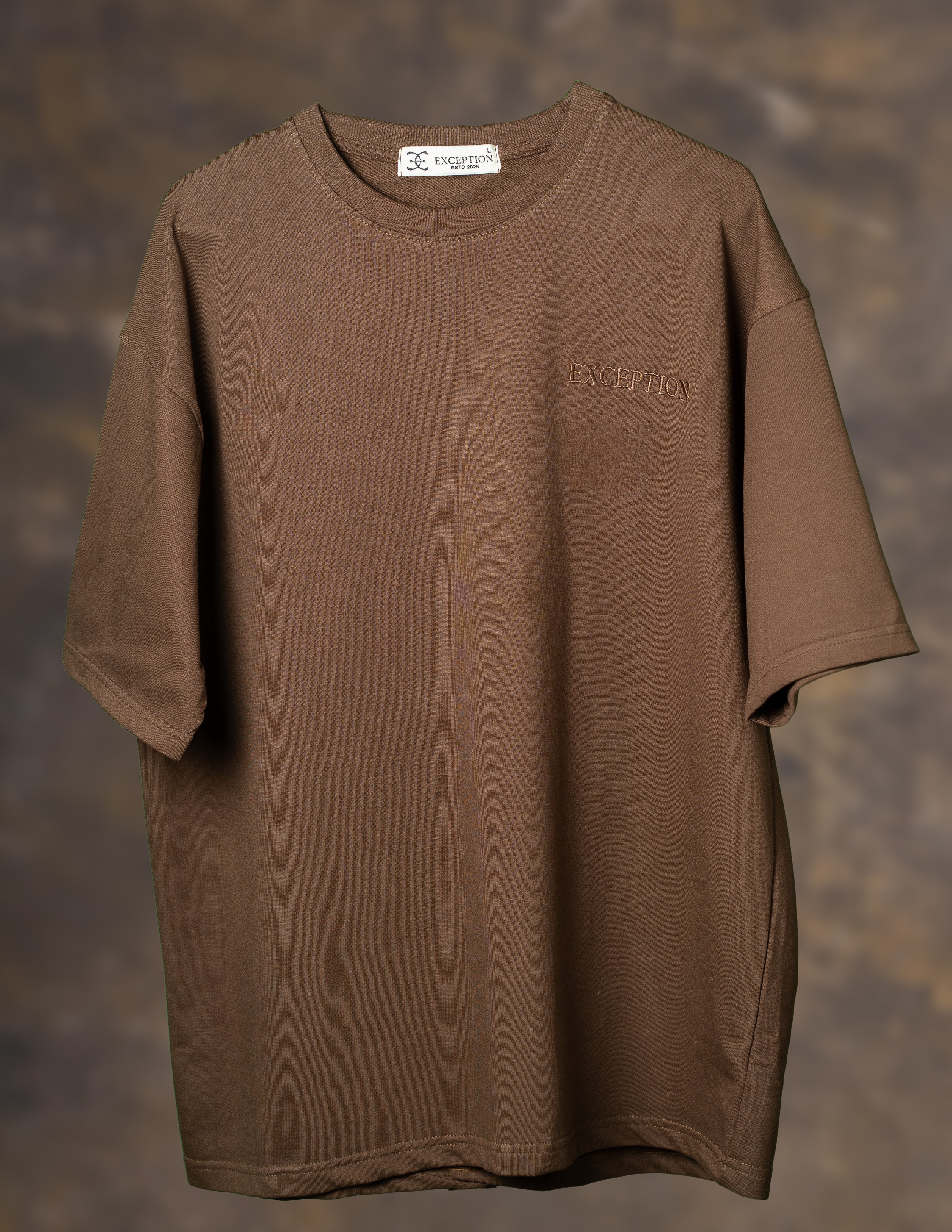 Embroidered Oversized Tshirt – “Still Growing”